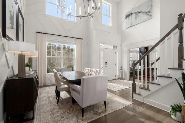 a view of a livingroom with furniture and a window