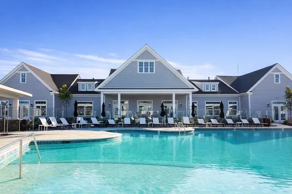 a view of a building with a yard