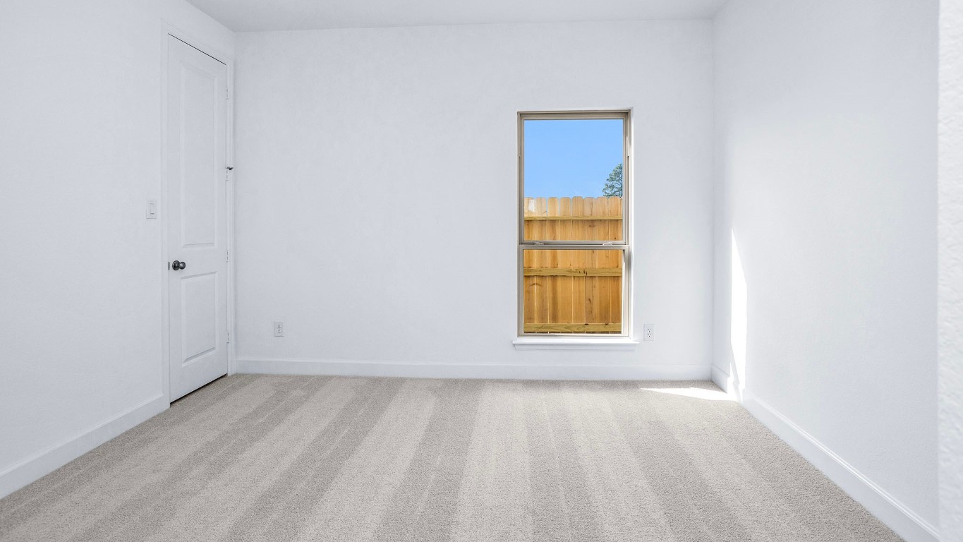 22306 Japanese Maple Lane Hockley, TX 77447 - Photo 12 of 18 an empty room with a window