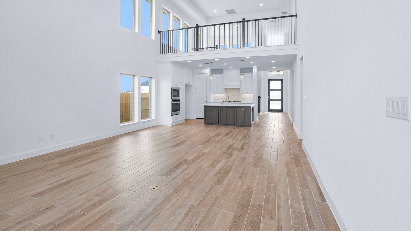 22306 Japanese Maple Lane Hockley, TX 77447 - Photo 5 of 18 a view of a livingroom with wooden floor