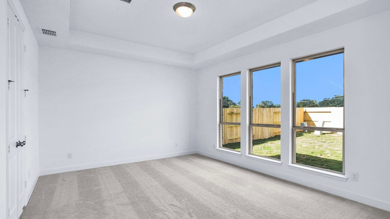 22306 Japanese Maple Lane Hockley, TX 77447 - Photo 7 of 18 an empty room with windows