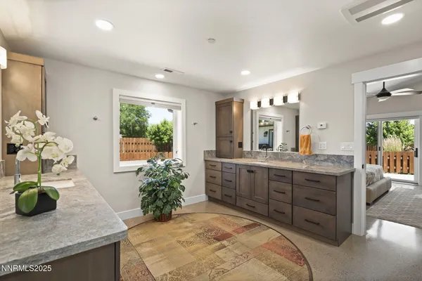 a bedroom with a bed and dresser