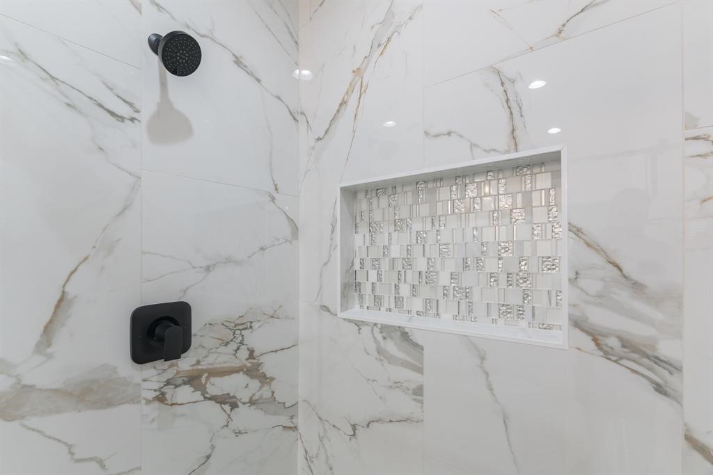 890 Lucky Street, Unit A Houston, TX 77088 - Photo 34 of 48 a bathroom with shower