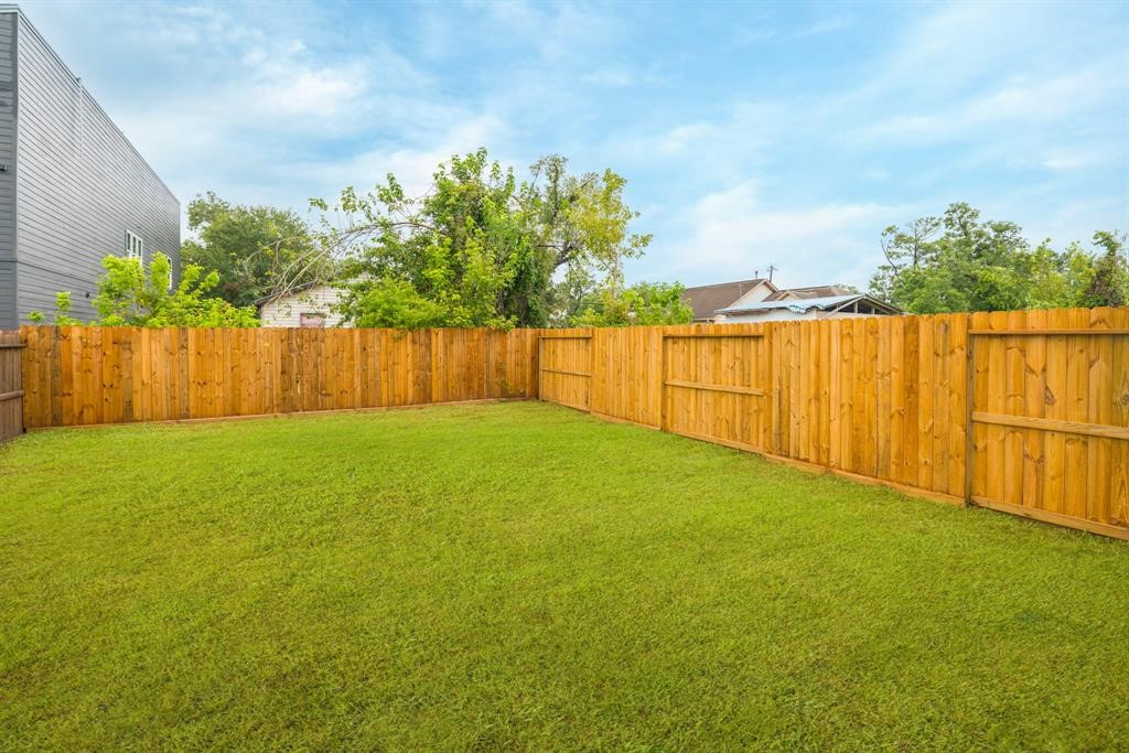 890 Lucky Street, Unit A Houston, TX 77088 - Photo 44 of 48 a view of swimming pool with a yard