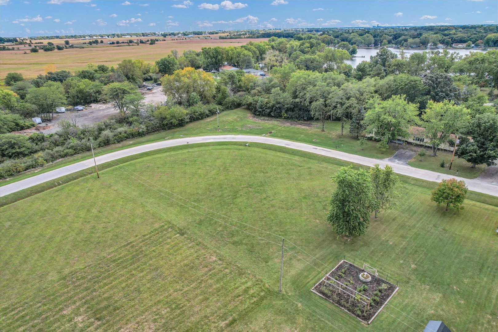 132 Comanche Trail Loda, IL 60948 - Photo 13 of 14 a view of a lush green space