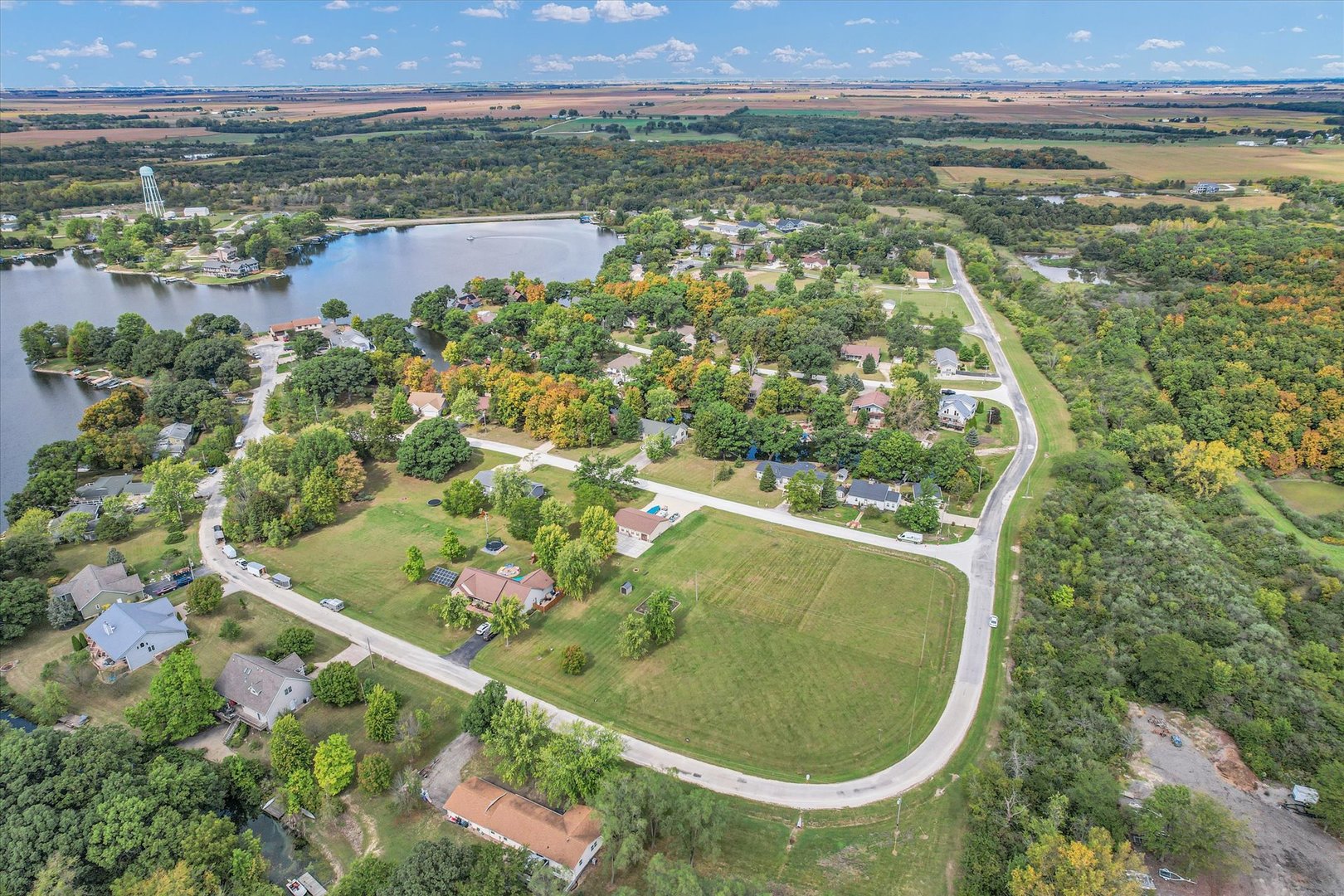 132 Comanche Trail Loda, IL 60948 - Photo 10 of 14 an aerial view of residential houses with outdoor space and trees