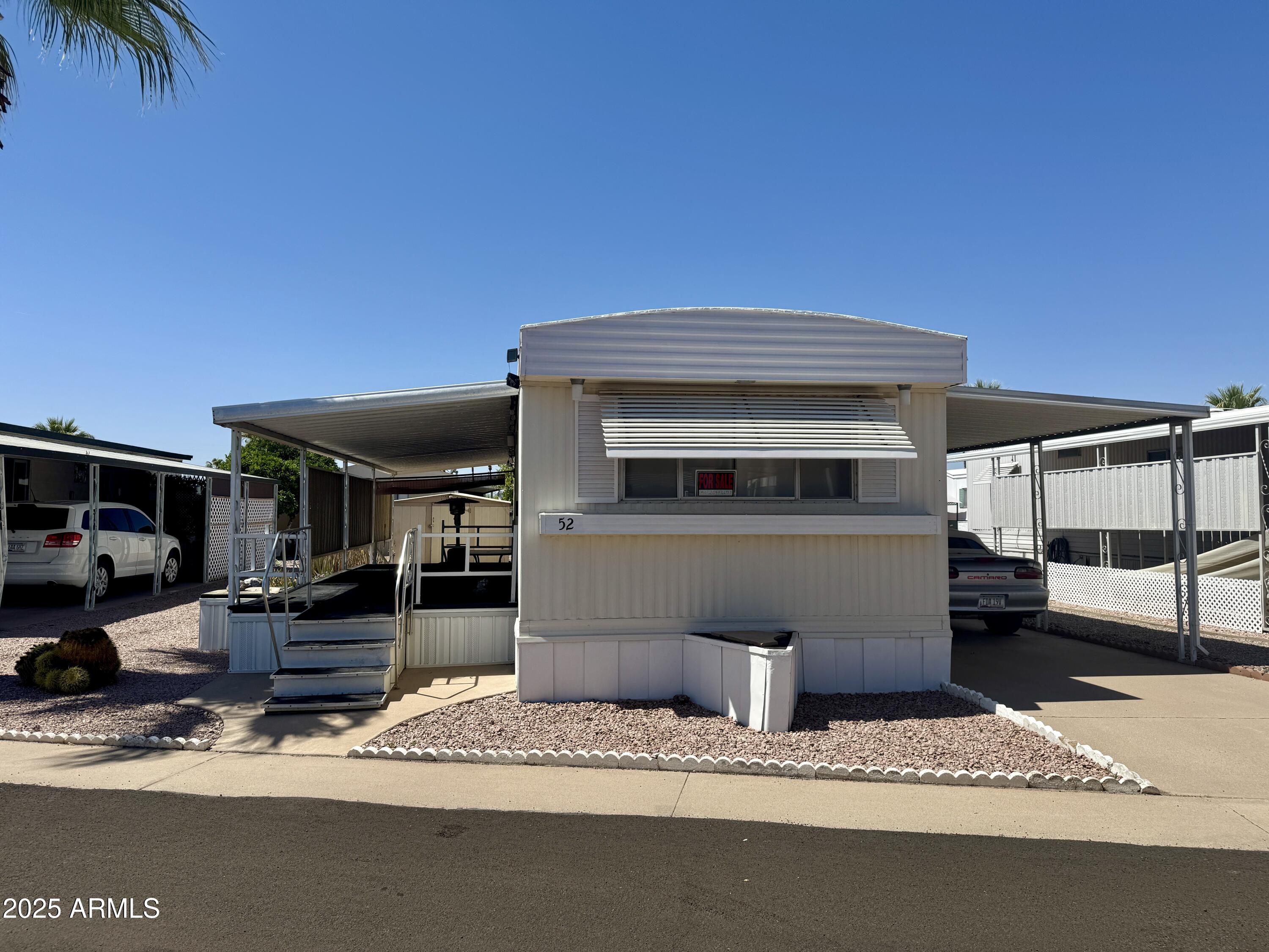 10220 East Apache Trail, Unit 52 Apache Junction, AZ 85120 - Photo 23 of 24 a view of a terrace