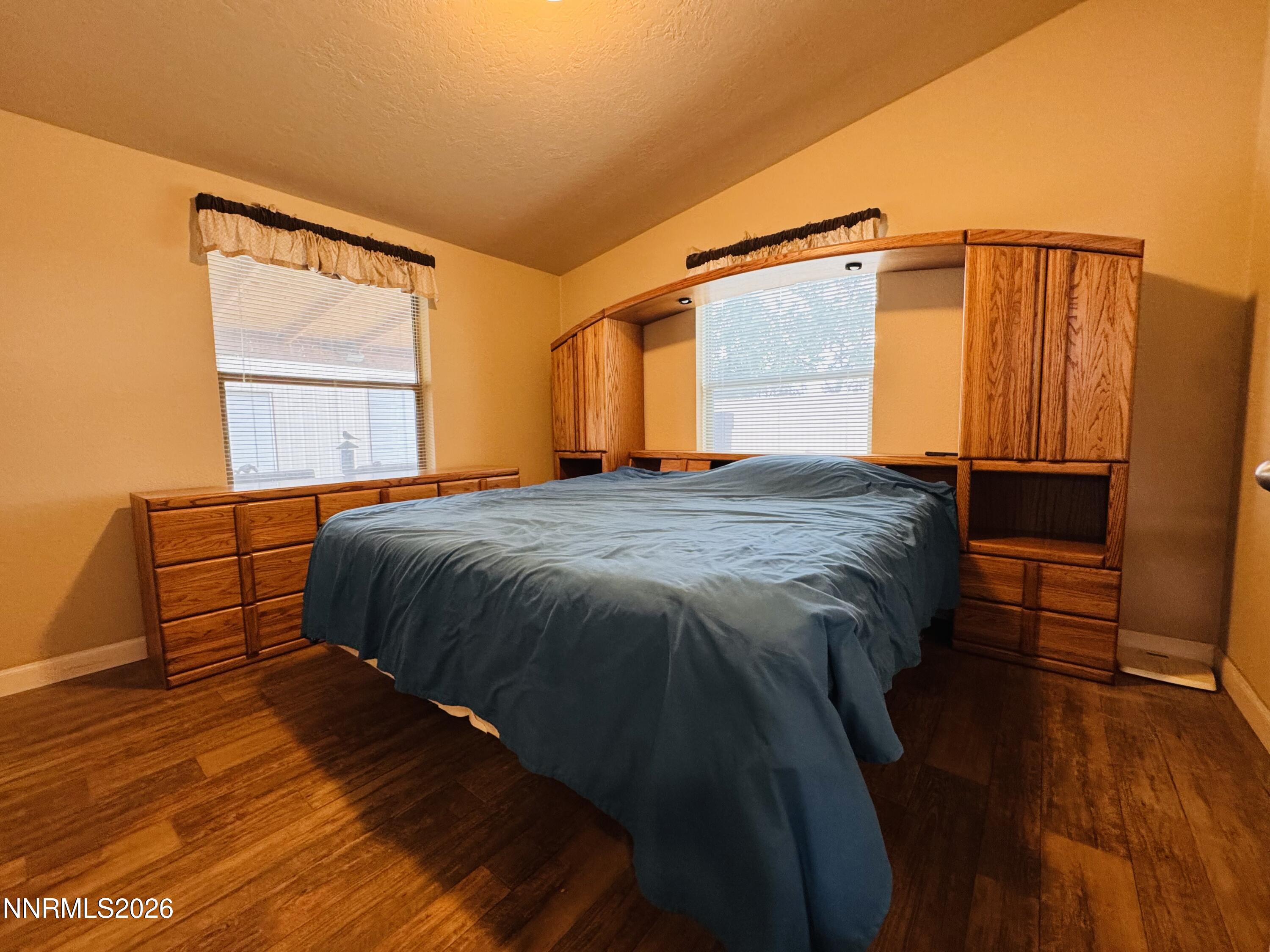 29400 Kings River Road Orovada, NV 89425 - Photo 23 of 40 a bed sitting in a bedroom next to a window