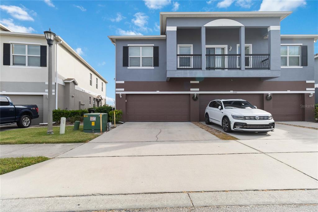 6560 South Goldenrod Road, Unit 79C Orlando, FL 32822 - Photo 2 of 36 a car parked in front of a house