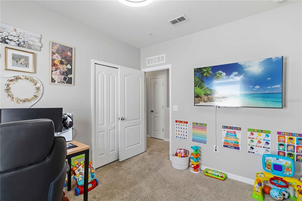 6560 South Goldenrod Road, Unit 79C Orlando, FL 32822 - Photo 26 of 36 a children room with toys