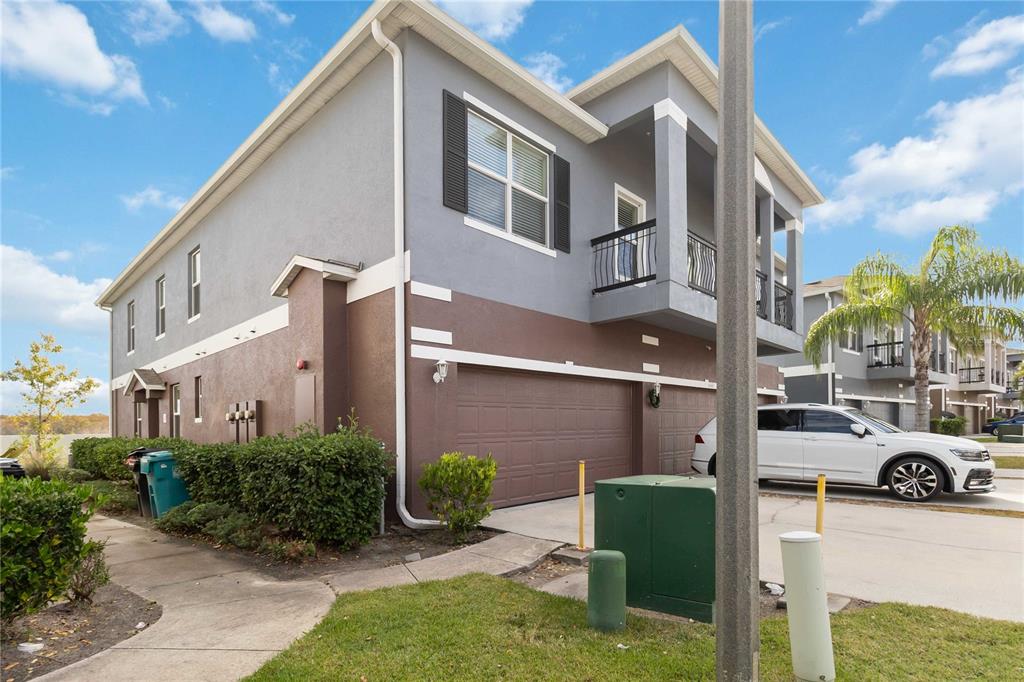 6560 South Goldenrod Road, Unit 79C Orlando, FL 32822 - Photo 3 of 36 a front view of a house with garden