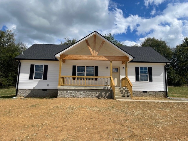 2741 Mc Connell Road Cornersville, TN 37047 - Photo 1 of 12 a front view of a house with a yard