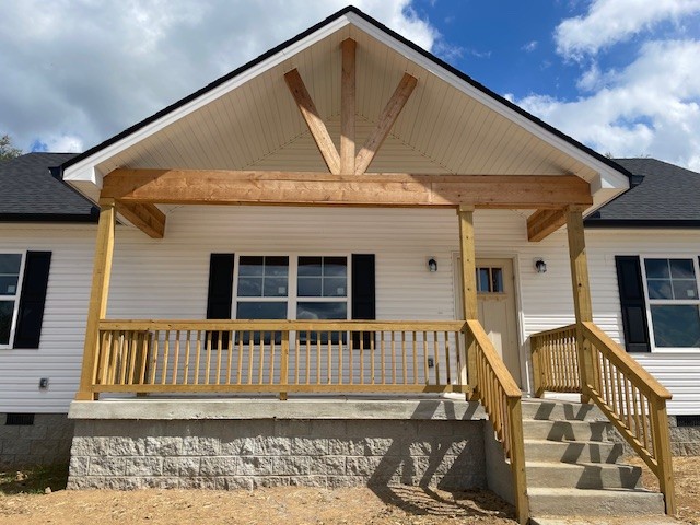 2741 Mc Connell Road Cornersville, TN 37047 - Photo 2 of 12 a front view of a house with stairs