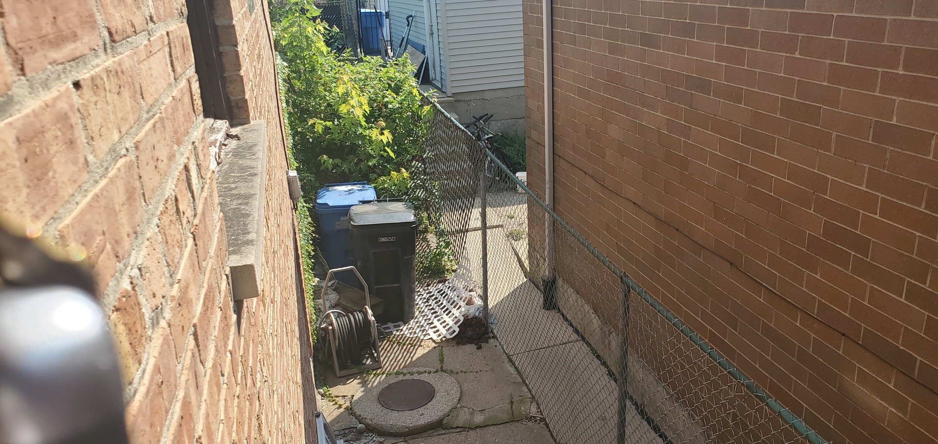 2947 South Farrell Street Chicago, IL 60608 - Photo 17 of 18 a bathroom with a sink and mirror