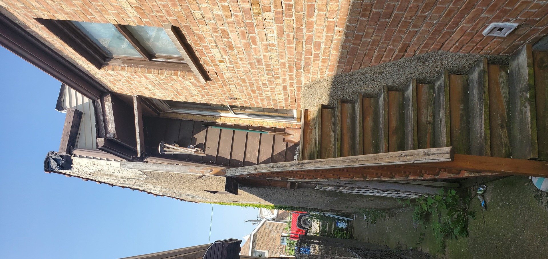 2947 South Farrell Street Chicago, IL 60608 - Photo 18 of 18 a backyard of a house with table and chairs