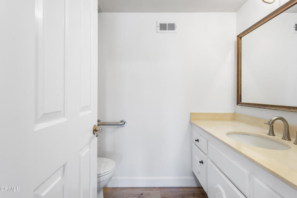 2524 Monaco Drive Oxnard, CA 93035 - Photo 20 of 50 a bathroom with a sink and a mirror