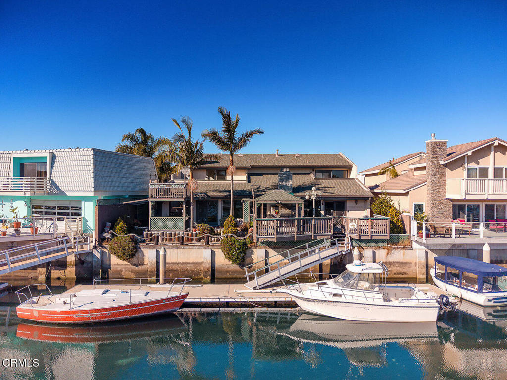 2524 Monaco Drive Oxnard, CA 93035 - Photo 2 of 50 a view of a lake with chairs