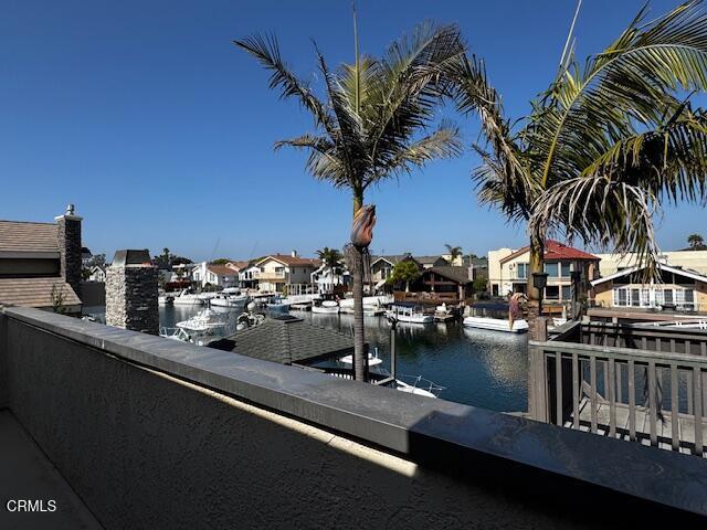 2524 Monaco Drive Oxnard, CA 93035 - Photo 29 of 50 a view of a balcony with chairs and potted plants