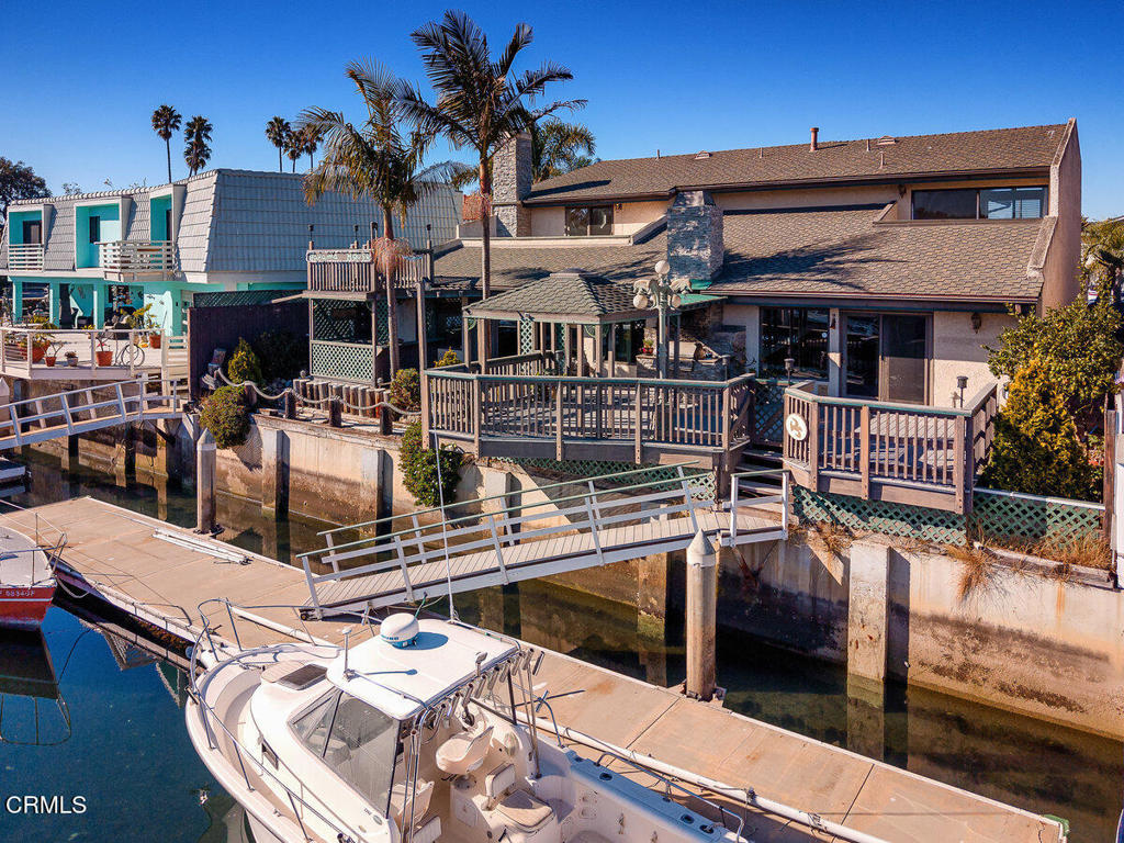 2524 Monaco Drive Oxnard, CA 93035 - Photo 46 of 50 a front view of a house with parking space