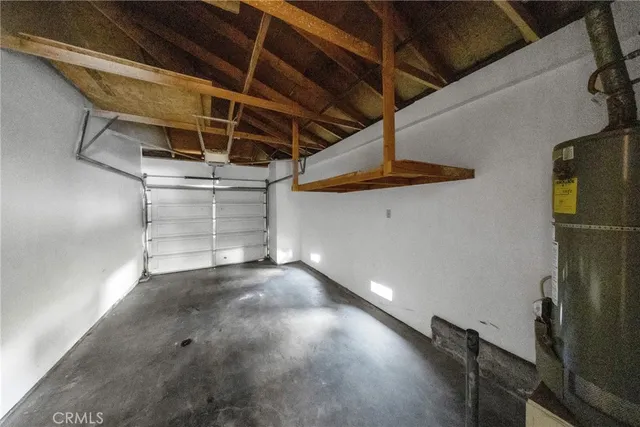 a view of a room with wooden walls