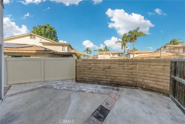 a view of a swimming pool with a lounge chairs