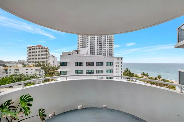 a view of a balcony with city view