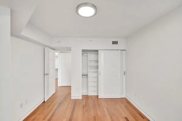 a utility room with closet dryer and washer