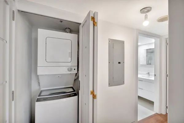 a living room with fireplace furniture and a flat screen tv