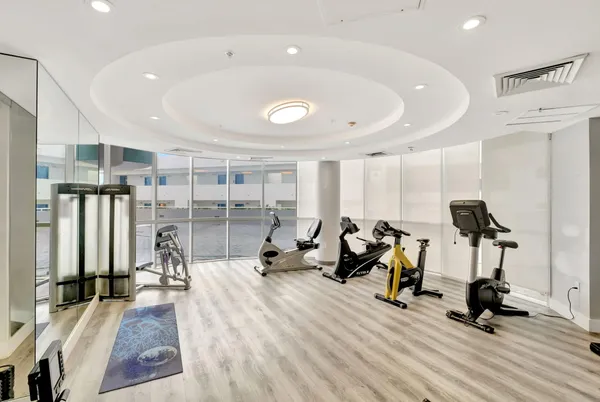 a view of a room with gym equipment