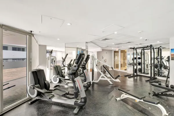a view of a room with gym equipment