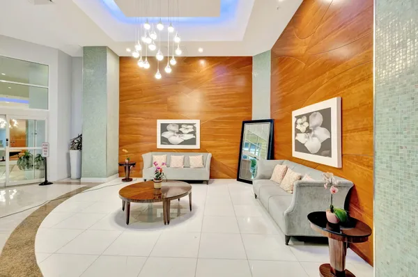 a large kitchen with a table and chairs