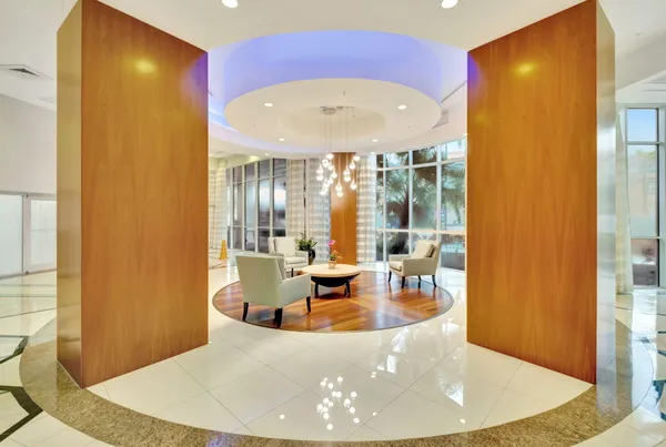 a view of bathroom with a tub and shower