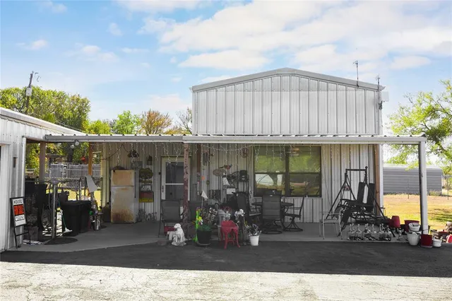 a view of a living room with entryway