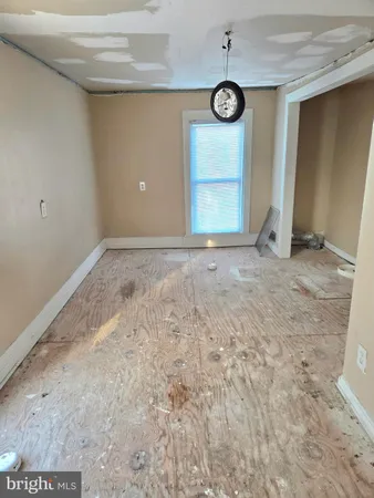 a view of a bathroom with a toilet and a bathtub