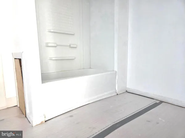 a bathroom with a mirror