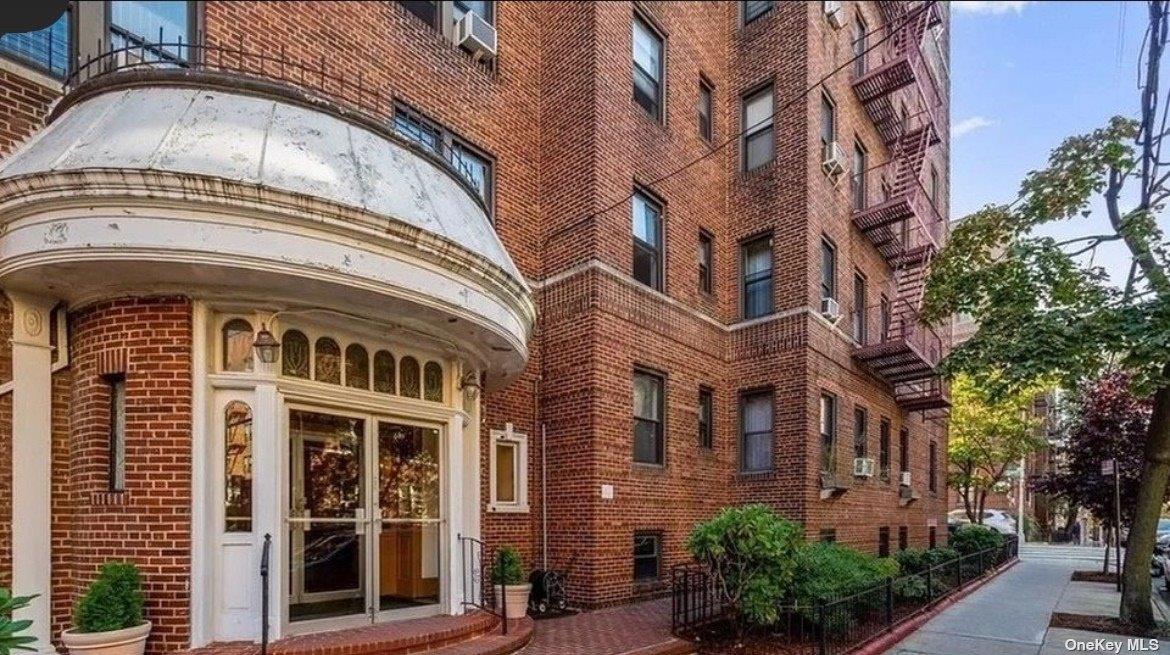 65-38 Booth Street, Unit 2F Queens, NY 11374 - Photo 2 of 13 a front view of a building