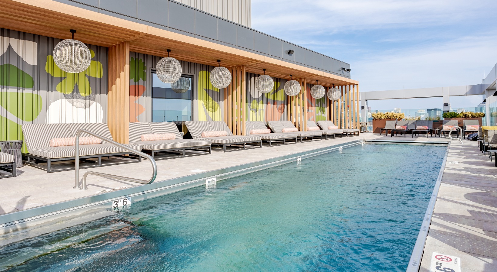 1114 West Carroll Avenue, Unit 3203 Chicago, IL 60607 - Photo 17 of 36 a view of a swimming pool with lounge chair