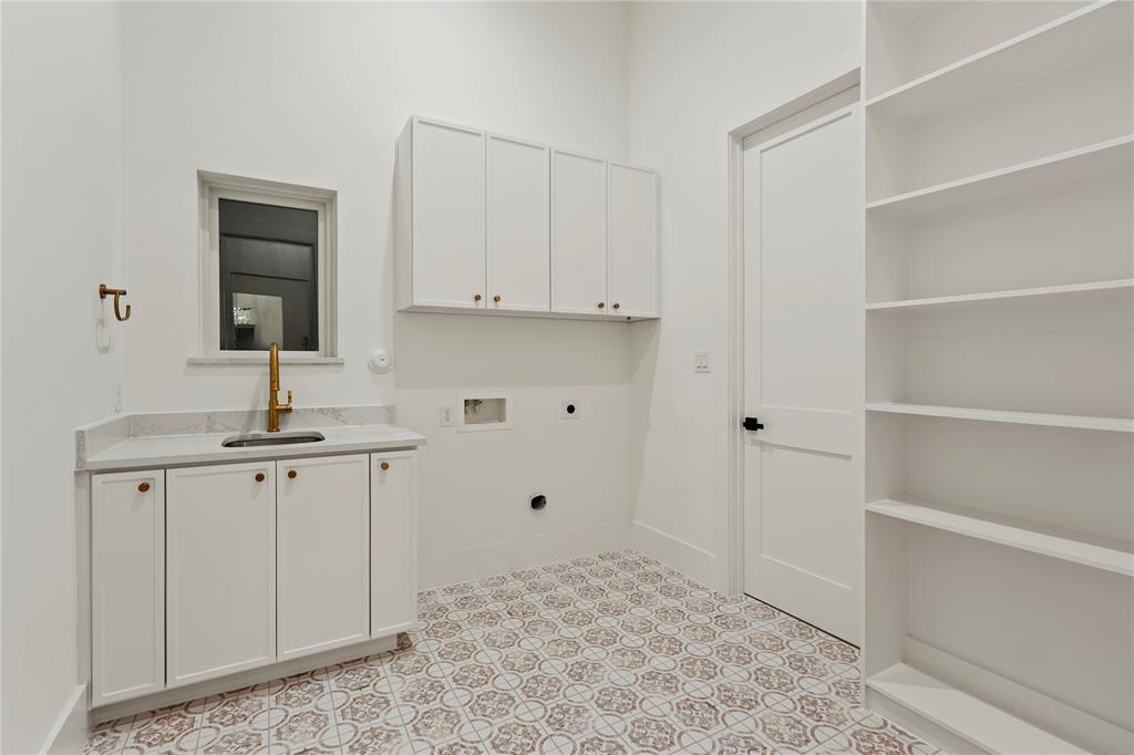8623 San Fernando Way Dallas, TX 75218 - Photo 14 of 40 a view of cabinets with wooden floor