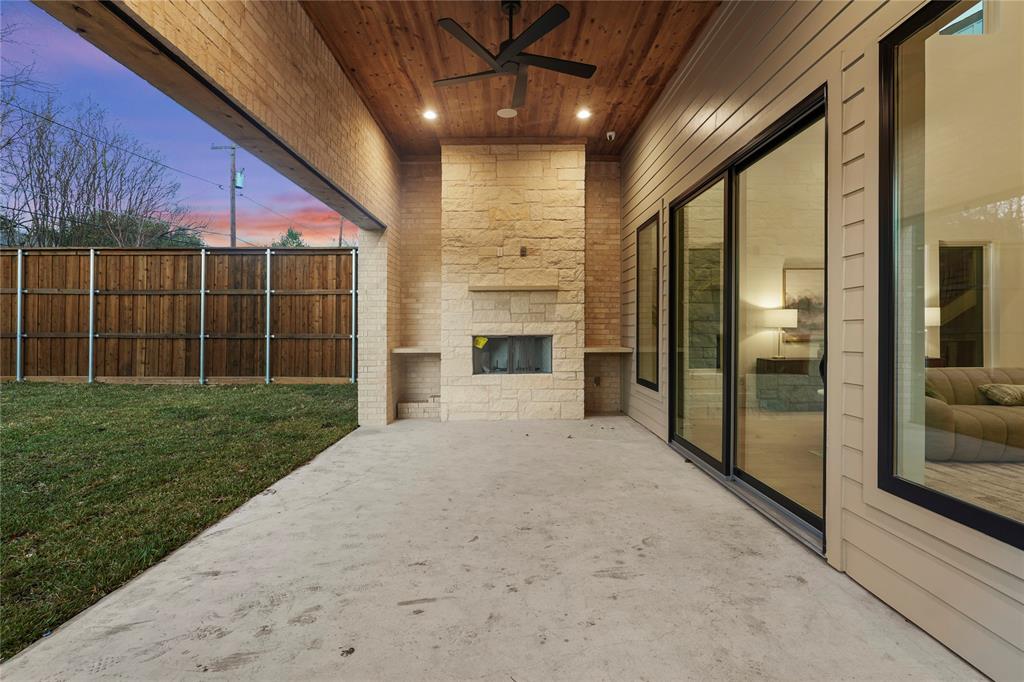 8623 San Fernando Way Dallas, TX 75218 - Photo 36 of 40 a view of a porch with a table and chairs