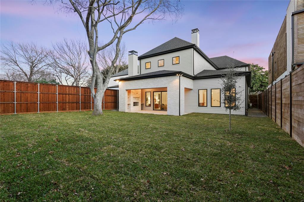 8623 San Fernando Way Dallas, TX 75218 - Photo 38 of 40 a front view of a house with a garden