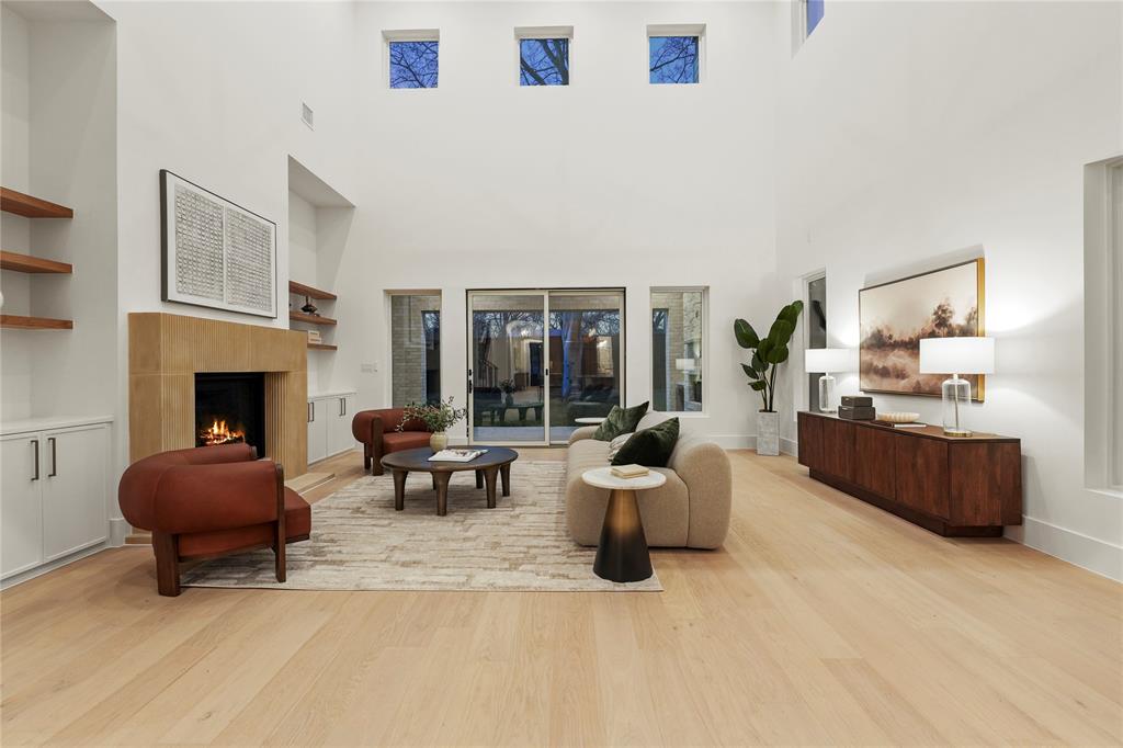 8623 San Fernando Way Dallas, TX 75218 - Photo 9 of 40 a living room with furniture and a fireplace