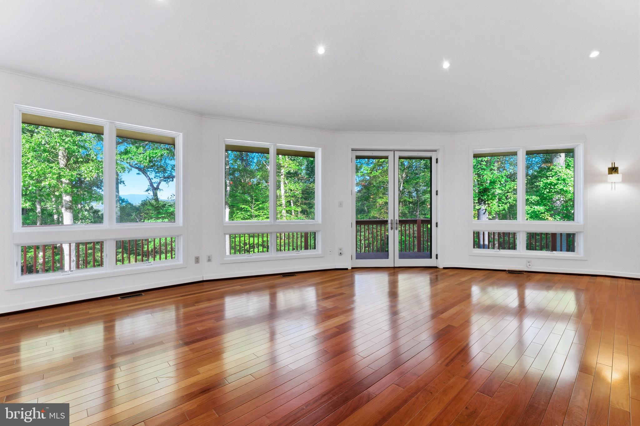 243 Aaron Mountain Road Castleton, VA 22716 - Photo 11 of 53 Panoramic wall of windows w/ mountain view
