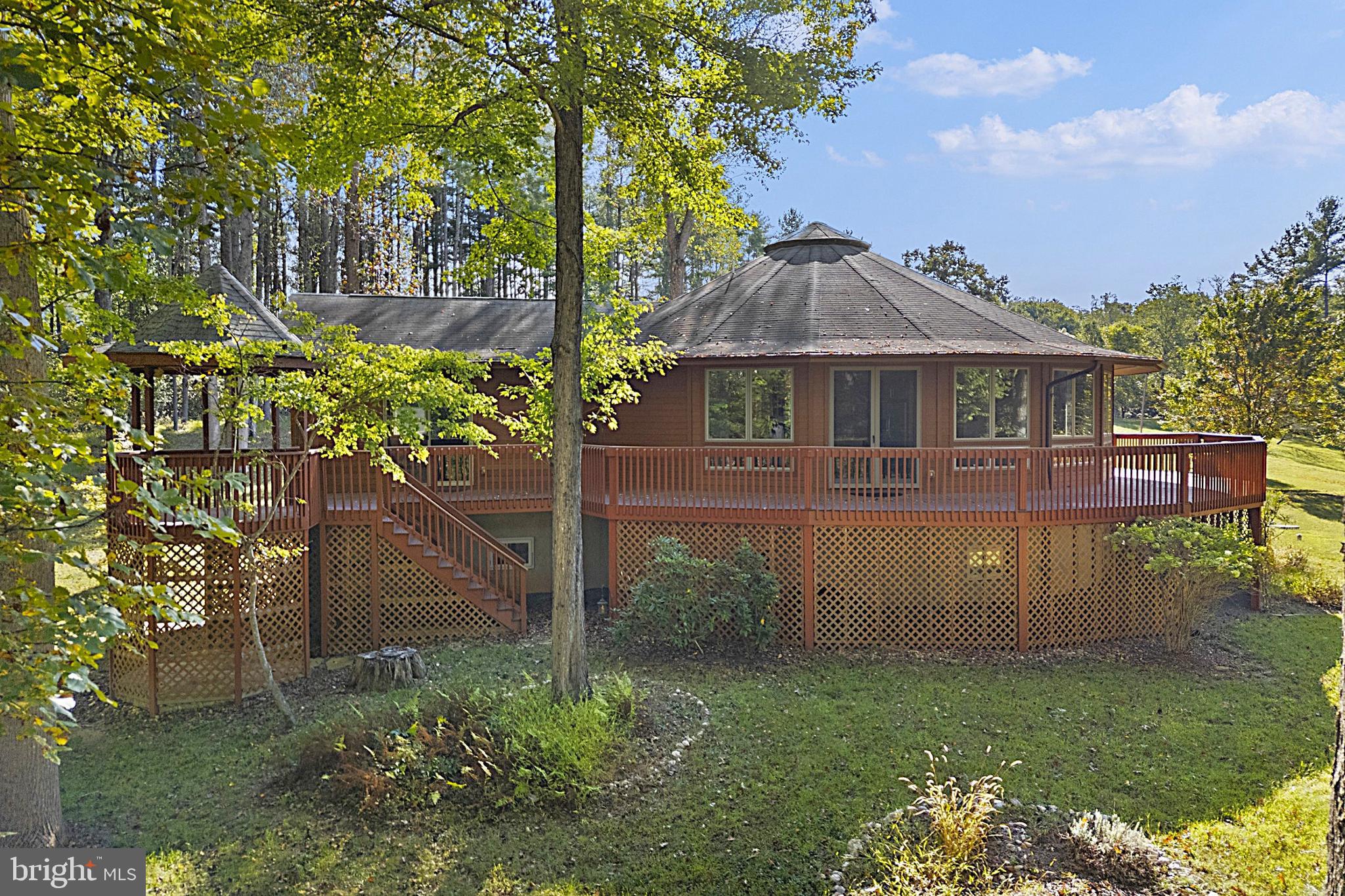 243 Aaron Mountain Road Castleton, VA 22716 - Photo 2 of 58 a front view of a house with a yard