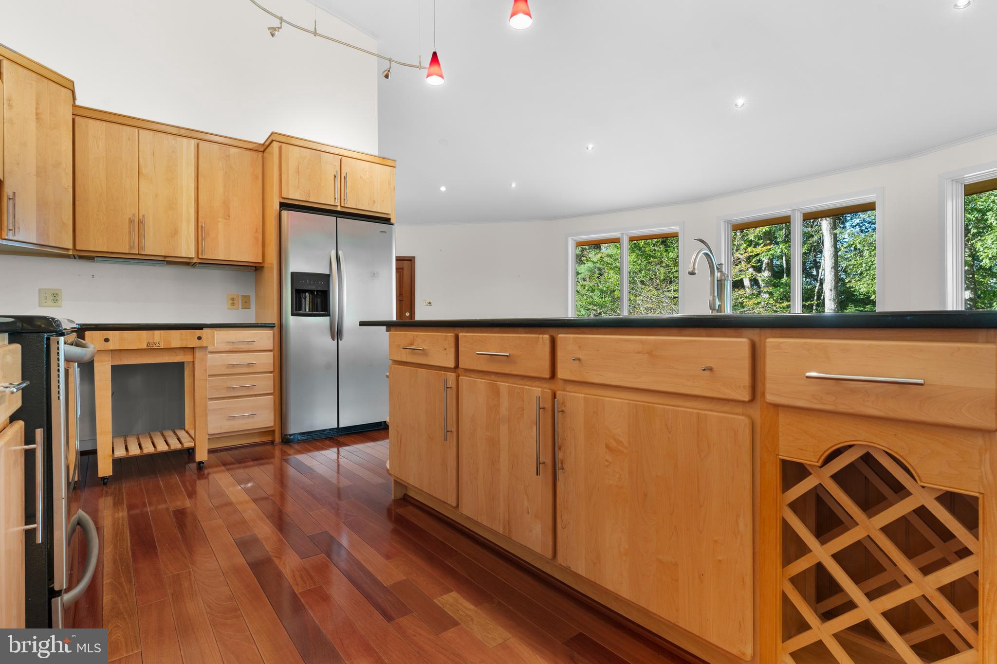 243 Aaron Mountain Road Castleton, VA 22716 - Photo 21 of 58 a kitchen with stainless steel appliances granite countertop a refrigerator and a stove top oven