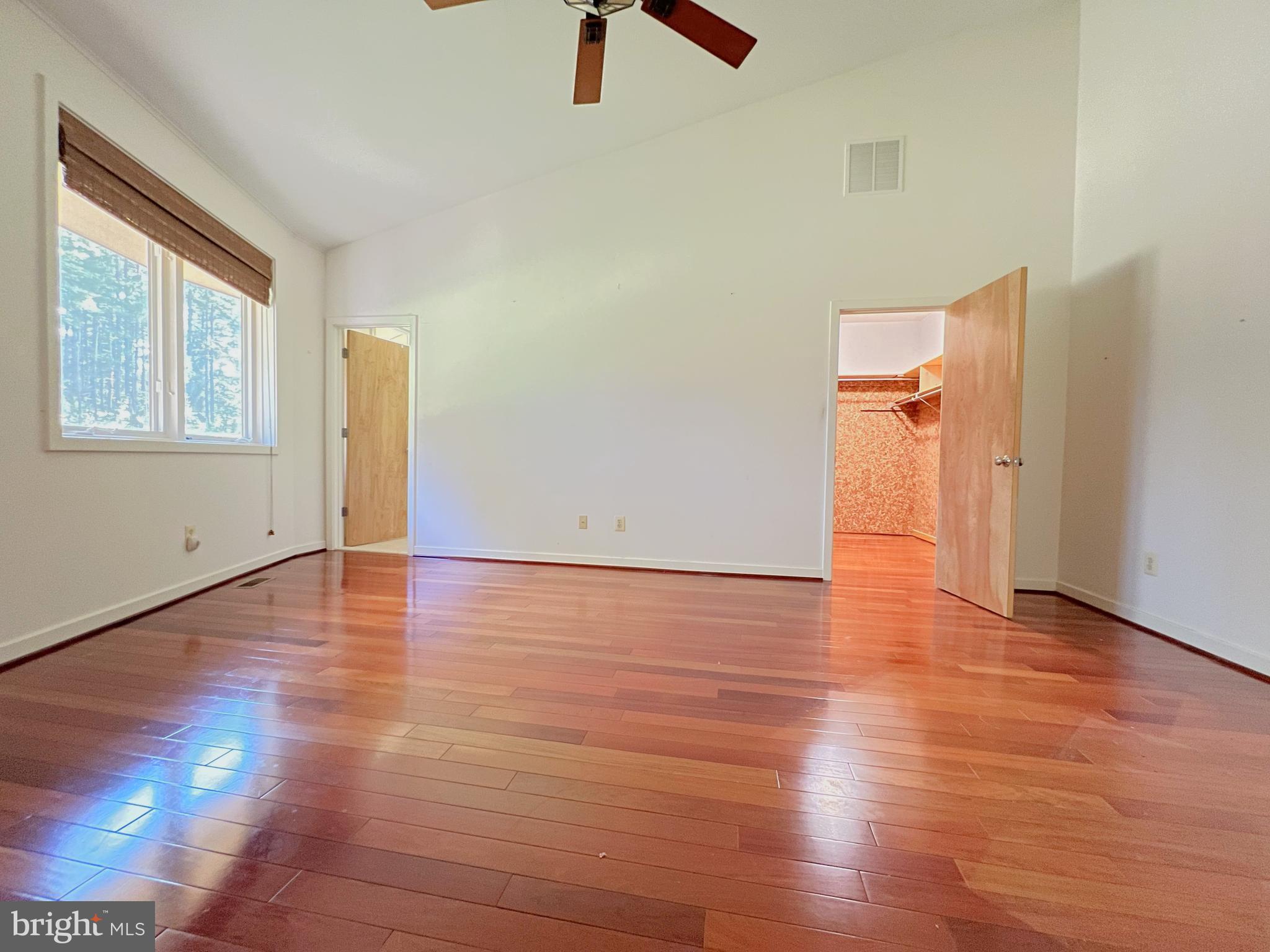 243 Aaron Mountain Road Castleton, VA 22716 - Photo 26 of 58 a view of room with hardwood floor and window