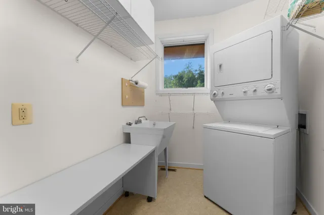 a green field with lots of trees in it