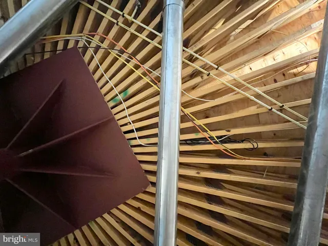 a view of a backyard with sitting area