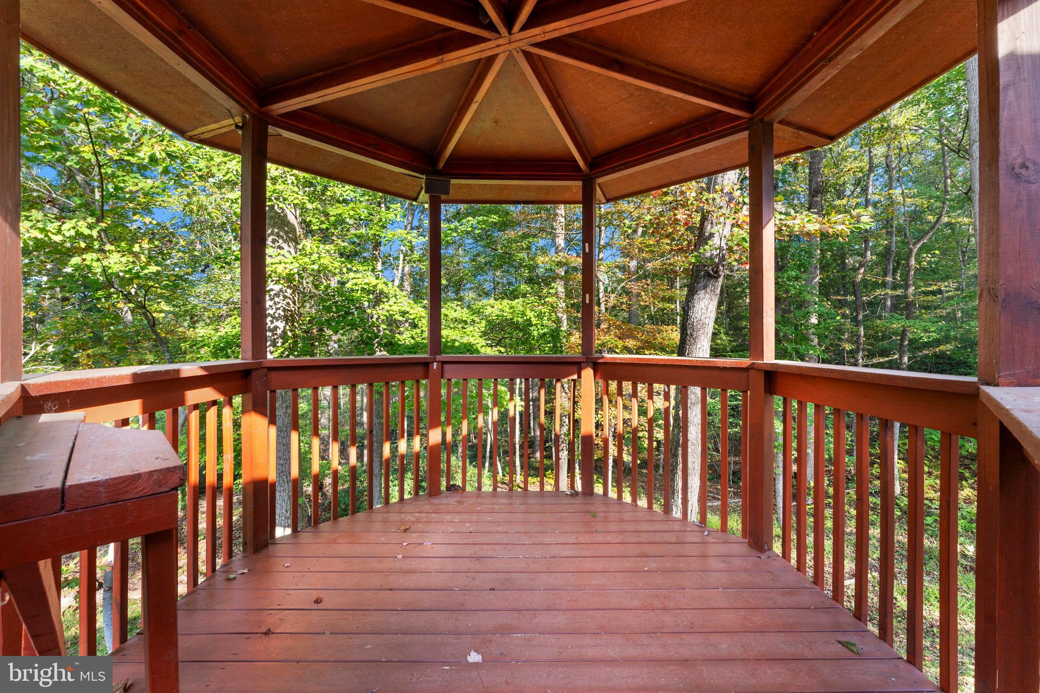 243 Aaron Mountain Road Castleton, VA 22716 - Photo 55 of 58 a view of a deck with wooden floor and outdoor space