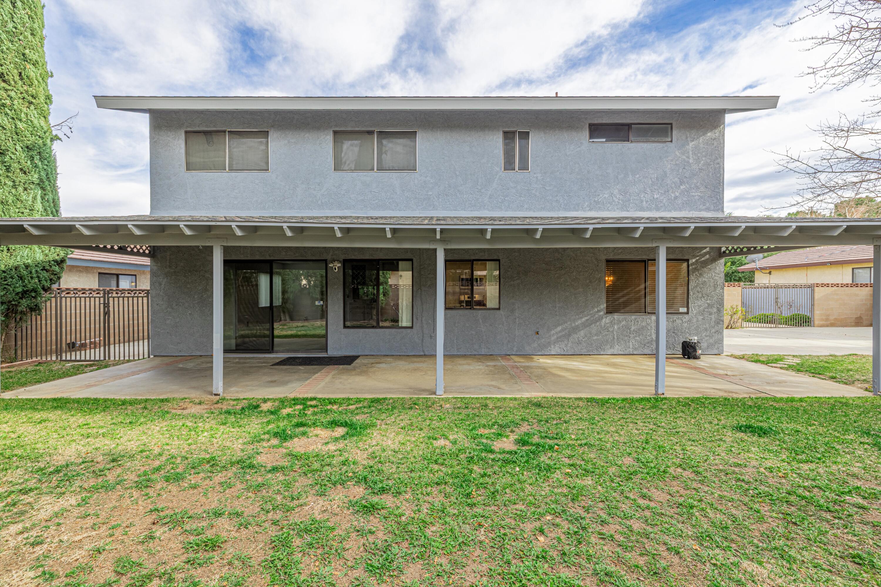 431 Fantasy Street Palmdale, CA 93551 - Photo 18 of 24 a house that has a big yard in front of it