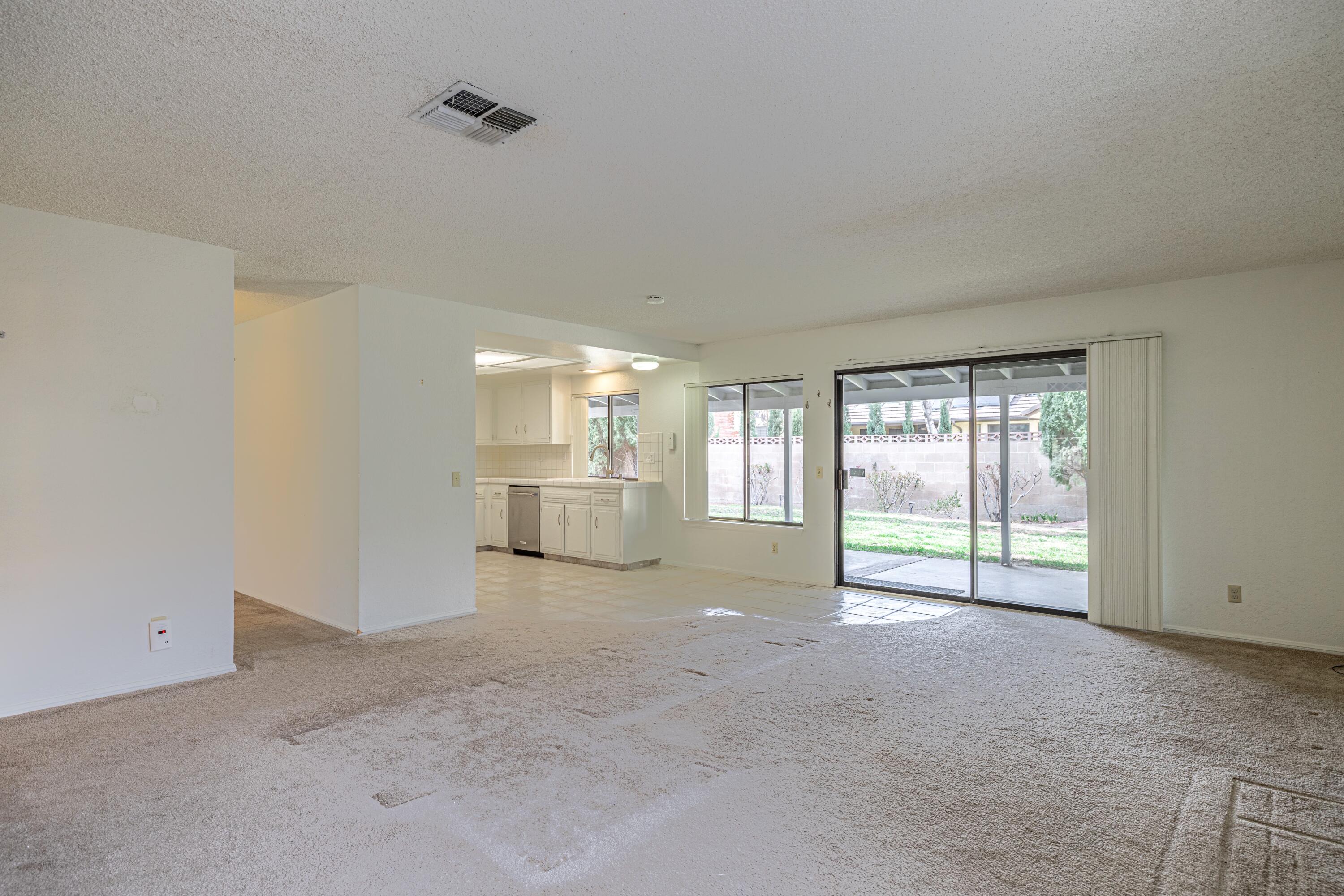 431 Fantasy Street Palmdale, CA 93551 - Photo 2 of 24 a view of a livingroom with a fireplace